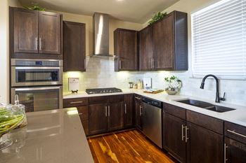 Modern kitchen with stainless steel appliances 